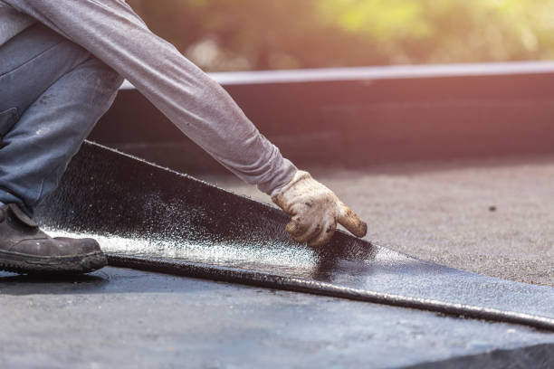 Professional Waterproofing technician working in Woodburn, VA